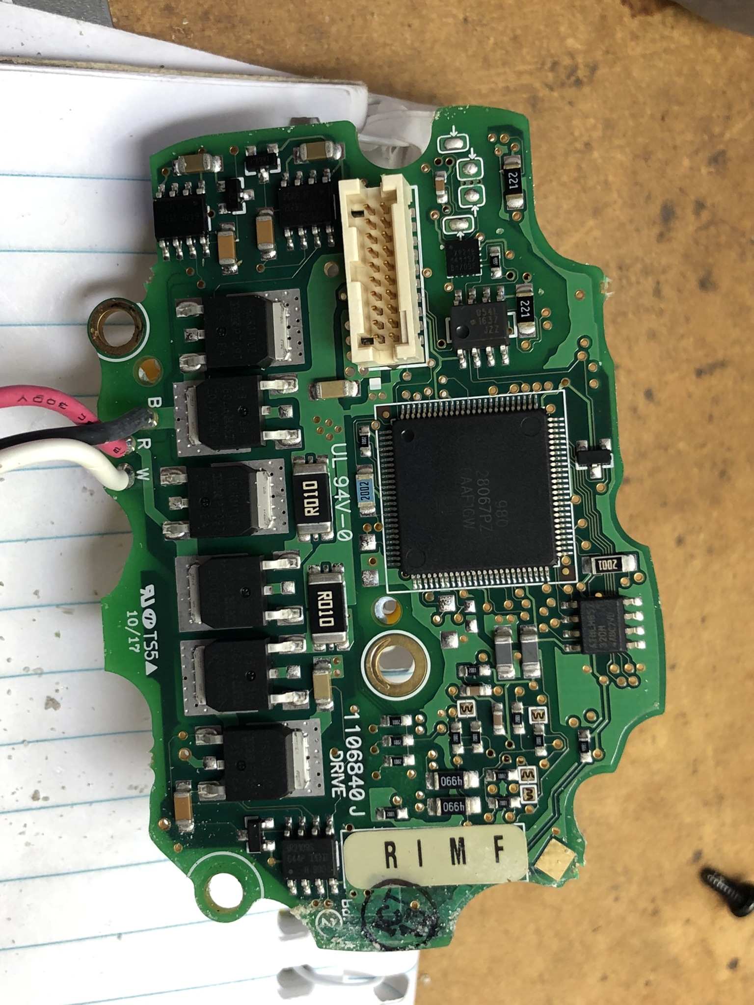 Internal PCB with large microcontroller, board-to-board connector, 3 gate-driver ICs and 6 surface mount mosfets